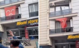 Öfkeli grup, MHP bayrağının asılı olduğu evi taşa tuttu